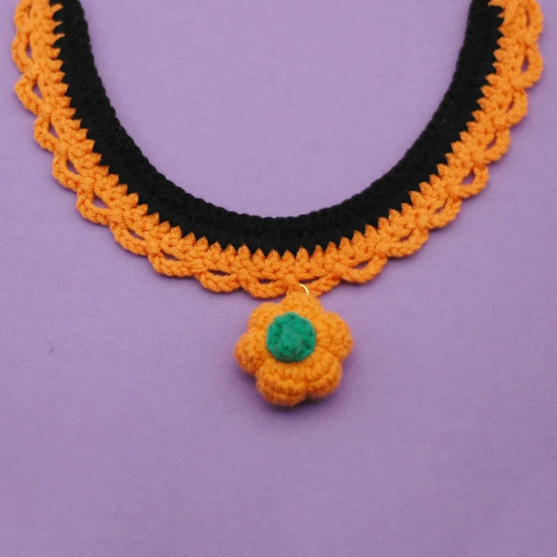 Hand crocheted wool Halloween pet collar in pumpkin colours with adjustable sizing