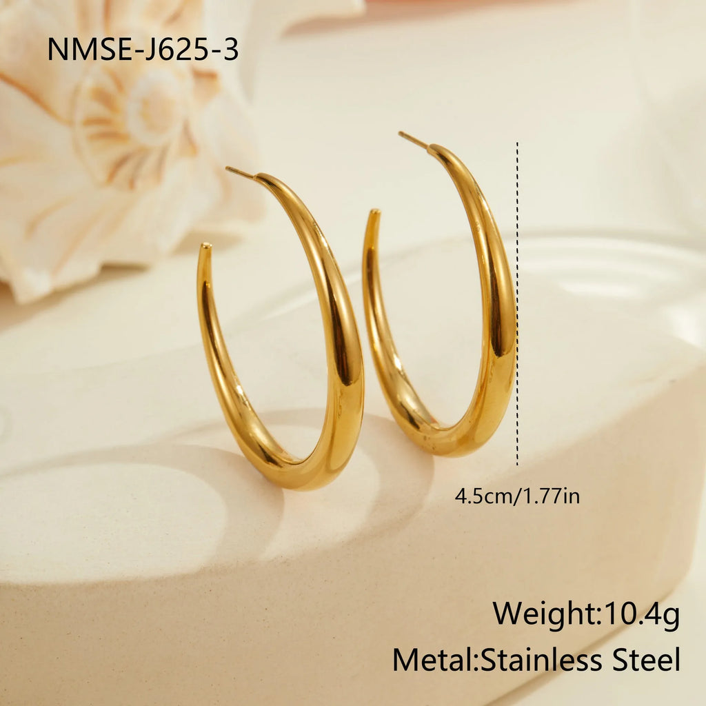 Geometric titanium steel hoop earrings in gold and steel finishes with vacuum plating