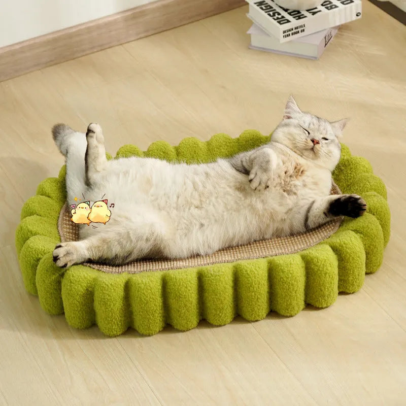 Green oval cat scratching pad and bed made from sisal material