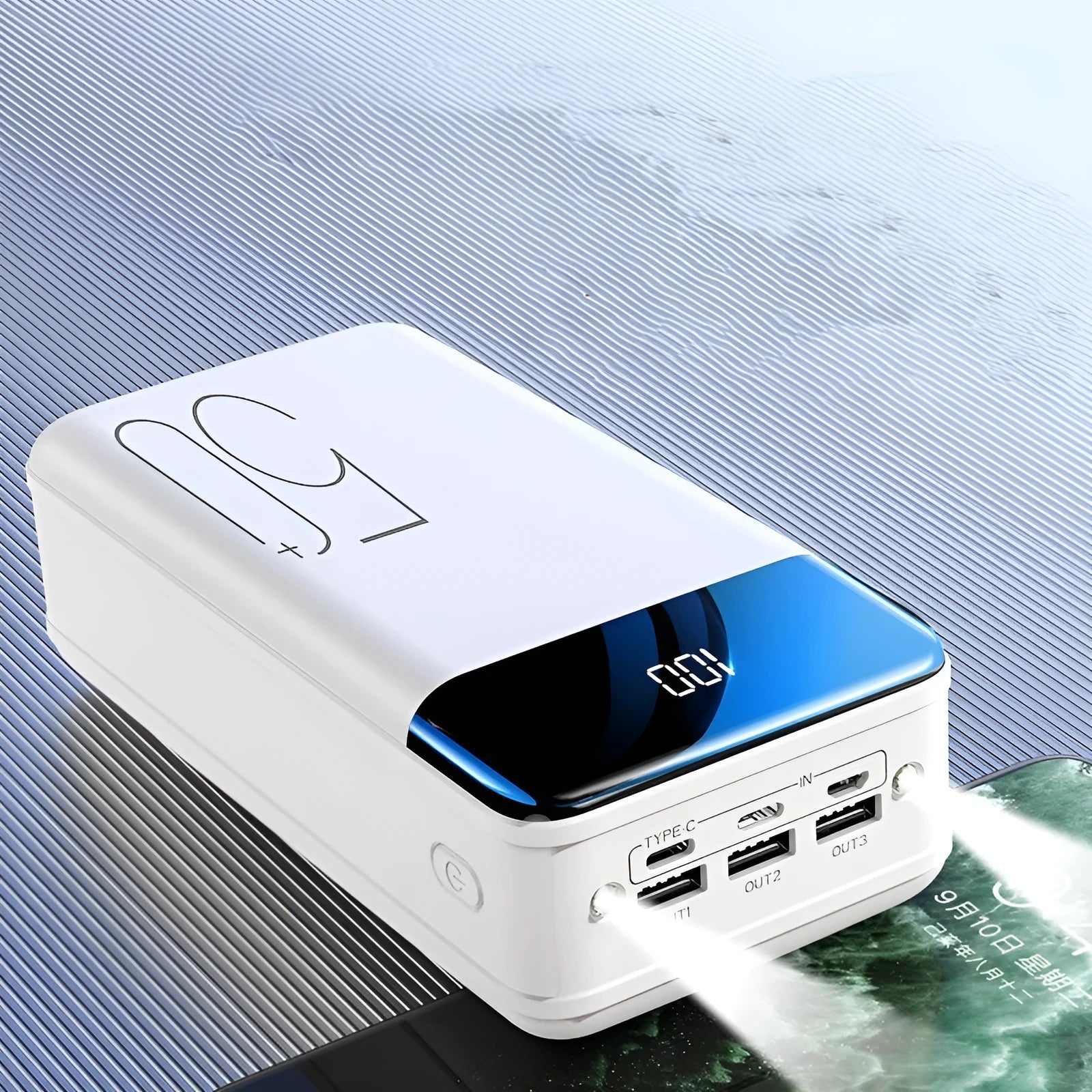Large 50000mAh power bank in black or white with three charging ports and polymer lithium-ion cells