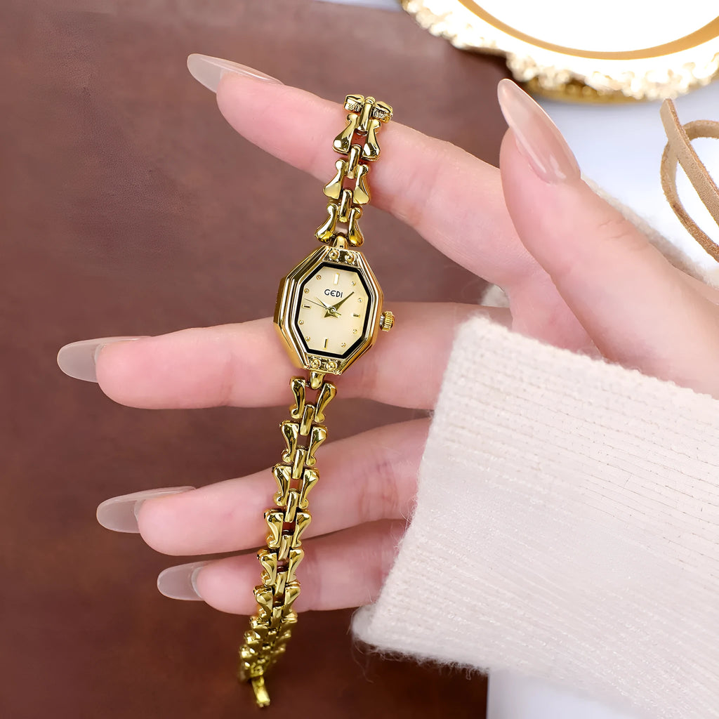 Octagonal women's quartz watch with 7.8mm alloy case, 17.5mm barrel dial, and steel gold finish
