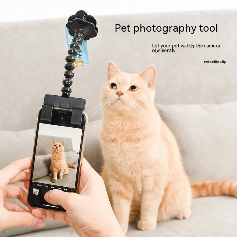 Black pet photography clip holder with rotating attachment for mobile phones and pet treats