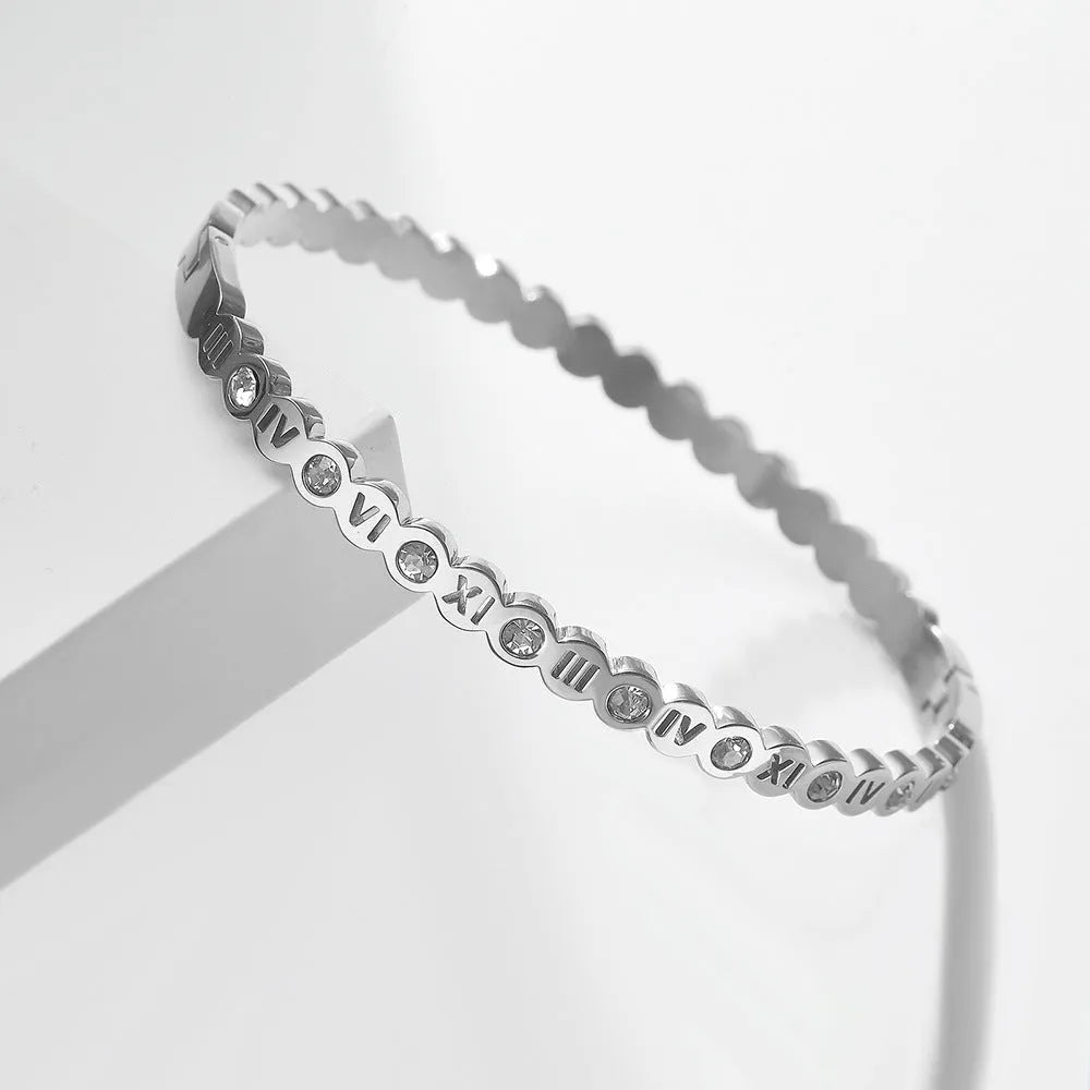 Korean style titanium steel bracelet with numerical design in gold, rose gold, and steel colour options.