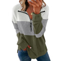 Women's loose fit leopard print pullover sweater with long sleeves on a hanger.