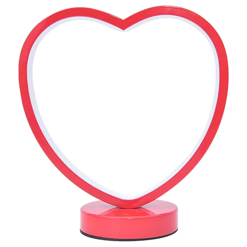 Creative red wedding lantern USB table lamp with warm light and red heart ring design on a tabletop