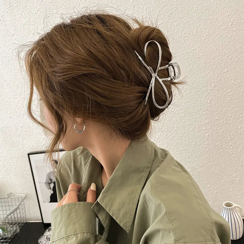 Women's alloy bow barrette hair clip in gold or silver with back-head grip