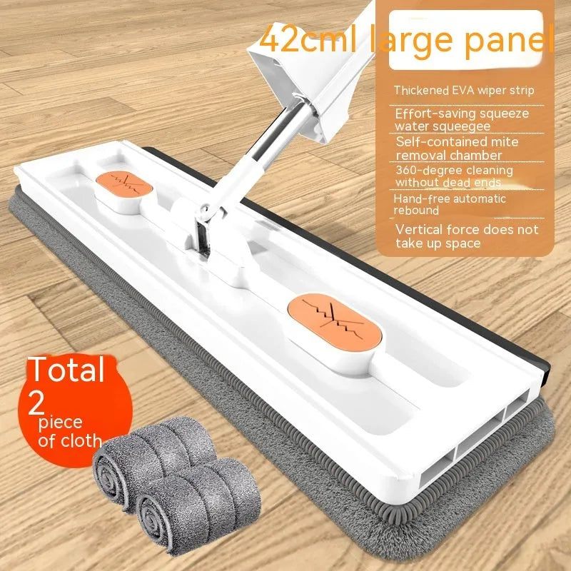 Large flat mop with stainless steel handle and blue mop cloth on hard floor