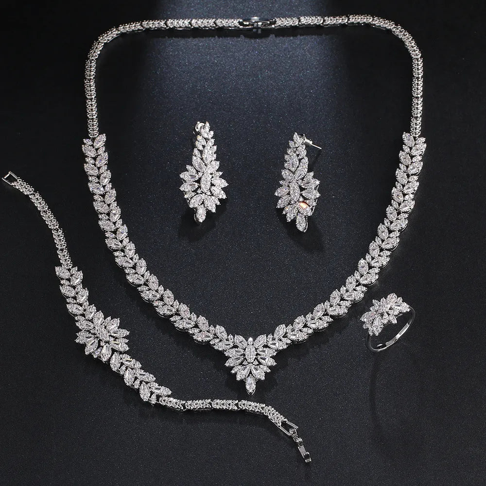 White copper bridal jewellery set with tassel earrings, necklace, bracelet, ring and snake bone chain