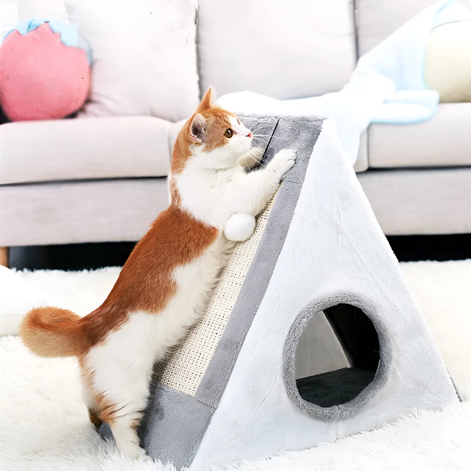 Triangle-shaped grey and white cat bed with integrated sisal scratching surface.