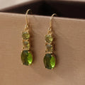 Green geometric copper earrings with quadrilateral shape and retro bohemian style