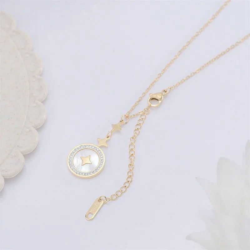 Gold hexagonal star pendant on a titanium steel chain necklace for women with an extender.