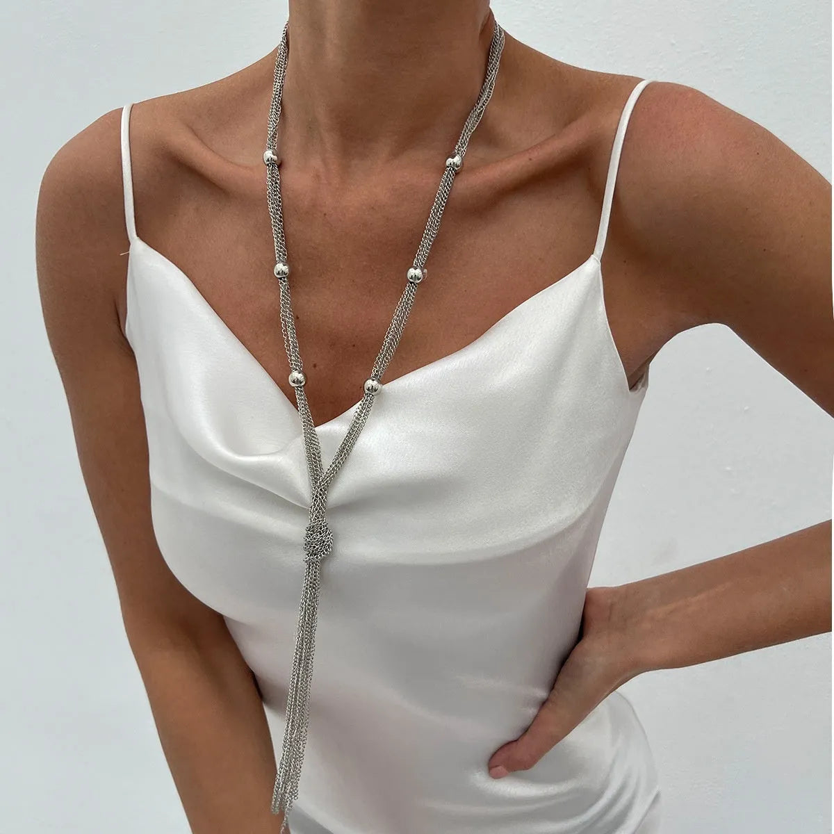 Long Y-shaped twin necklace with tassel pendant in gold electroplated alloy with imitation pearl chain