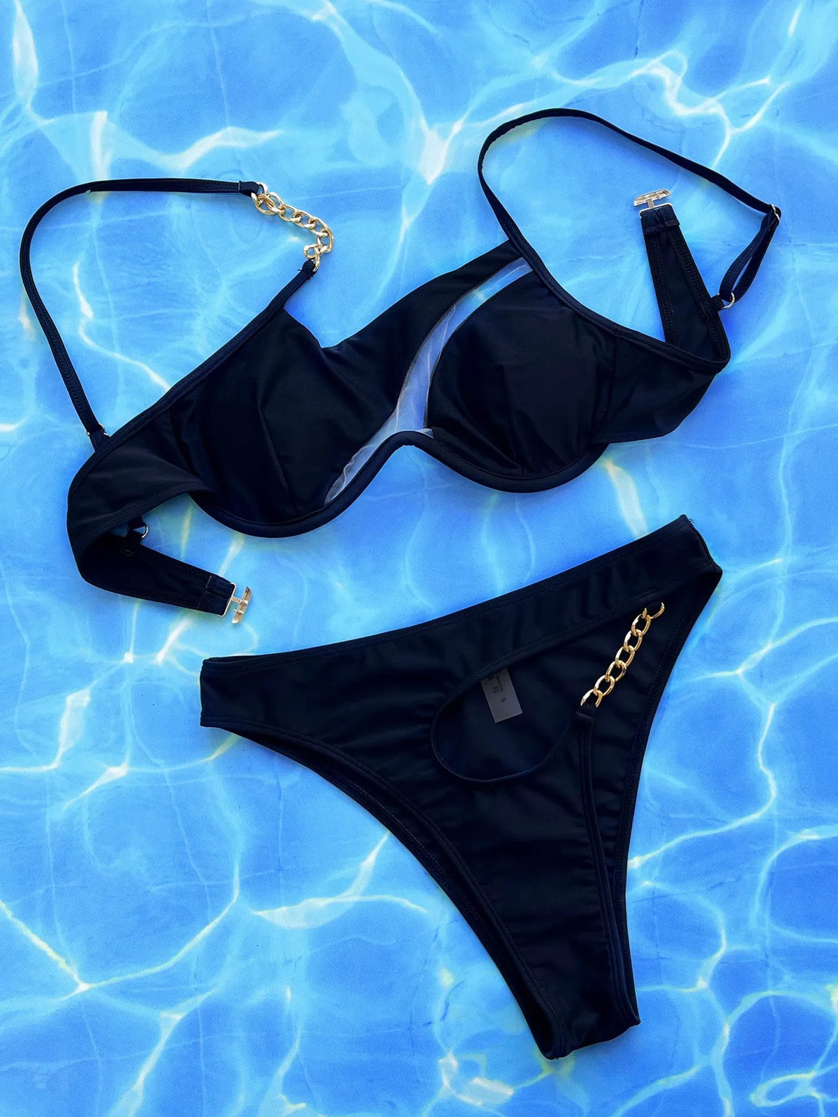 Women's black nylon hollow split swimsuit two-piece set with top and pants, sizes S M L