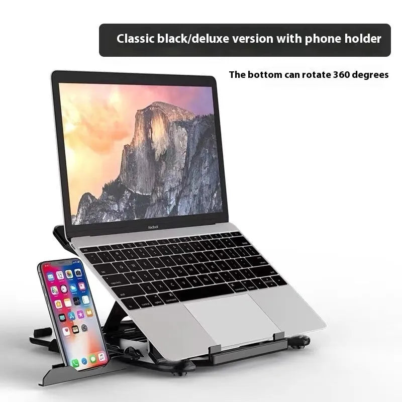 Black ABS plastic laptop cooling bracket stand on a wooden desk