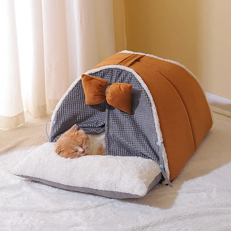 Semi-enclosed cat nest in creamy yellow cloth with grey mat, suitable for all-season indoor use