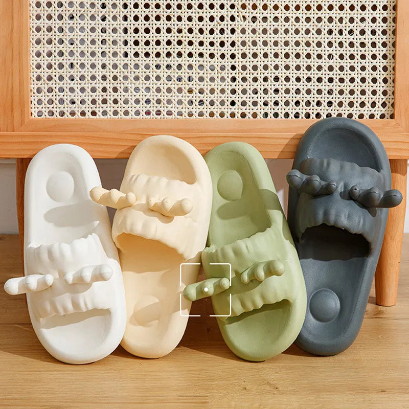 Women's deer horn pattern flip-flop slippers in light yellow with a textured EVA sole.