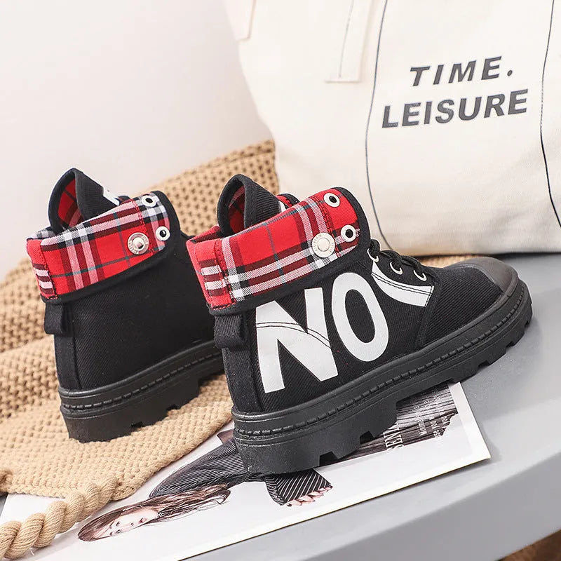 Women's high-top canvas short boots with cross straps and buckles in black, side view