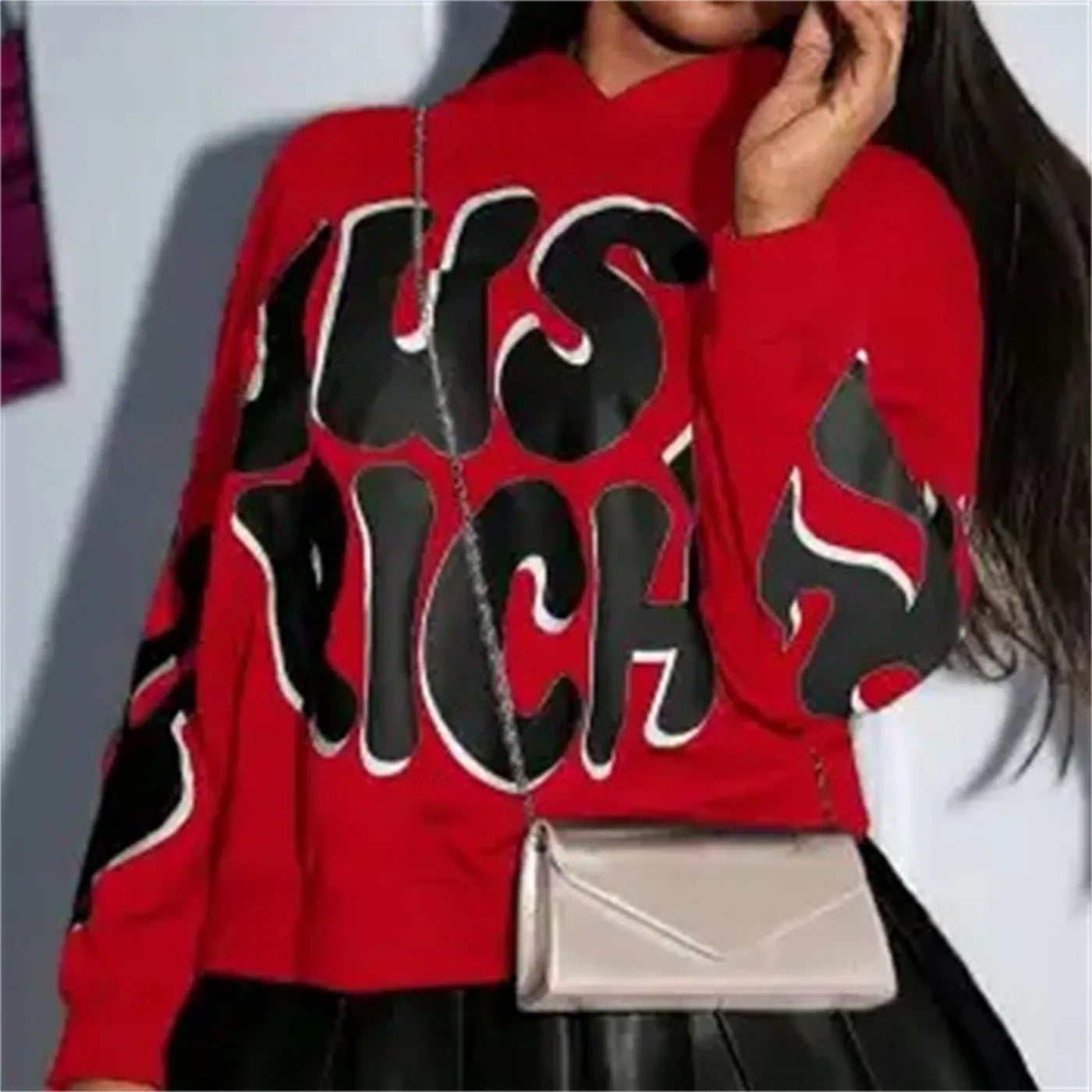 Red letter printed casual loose hooded sweater on display showing front graphic