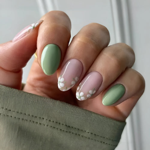 Long almond artificial nails with white little flower pattern and jelly glue rub in CW680 colour classification