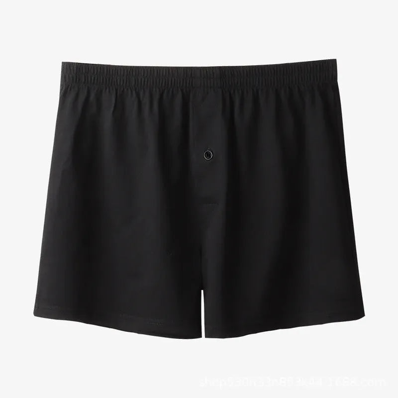Men's high-waist cotton boxer shorts in black, grey, and navy blue on a size chart