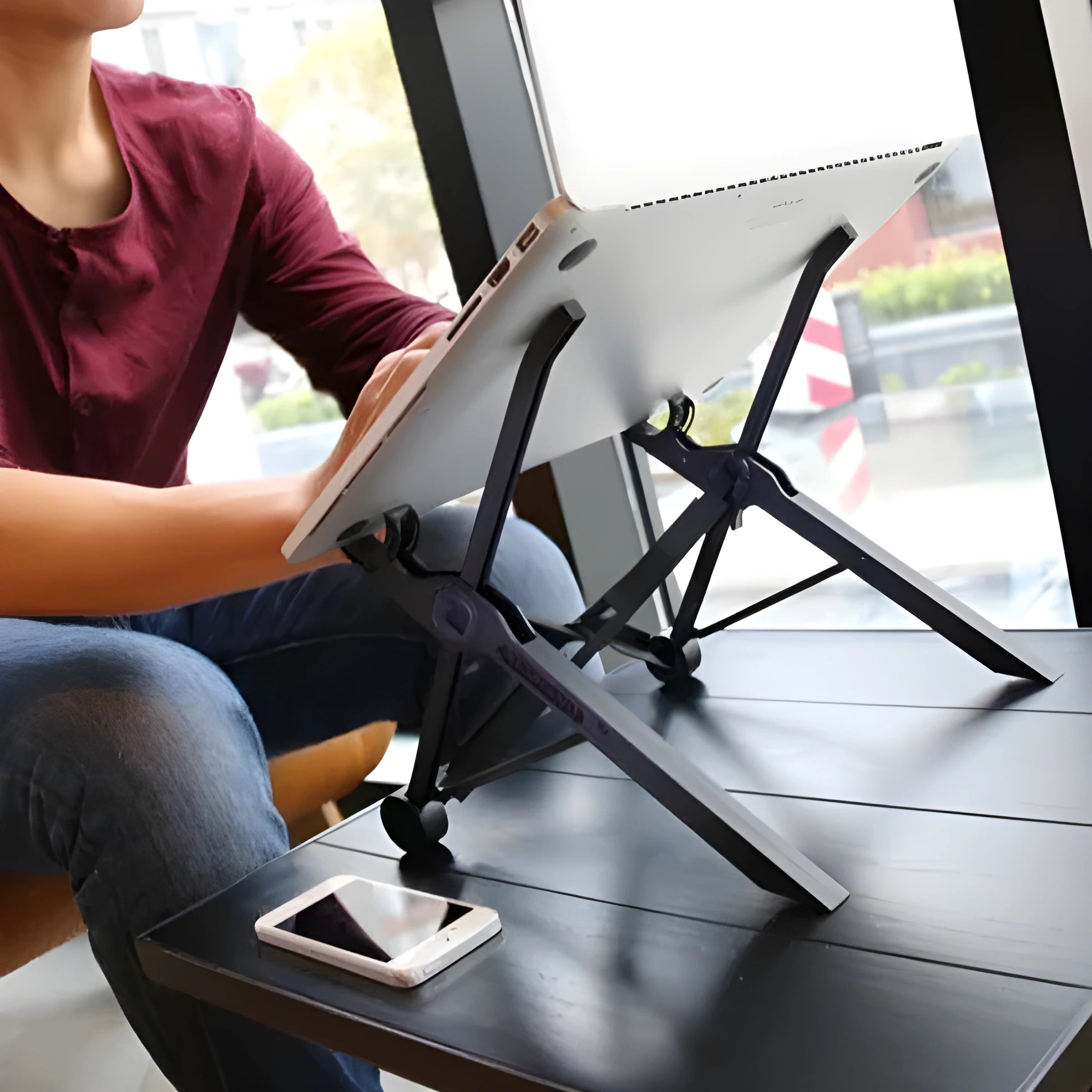 Portable folding computer bracket in sagacious black with carrying case, showing folded dimensions