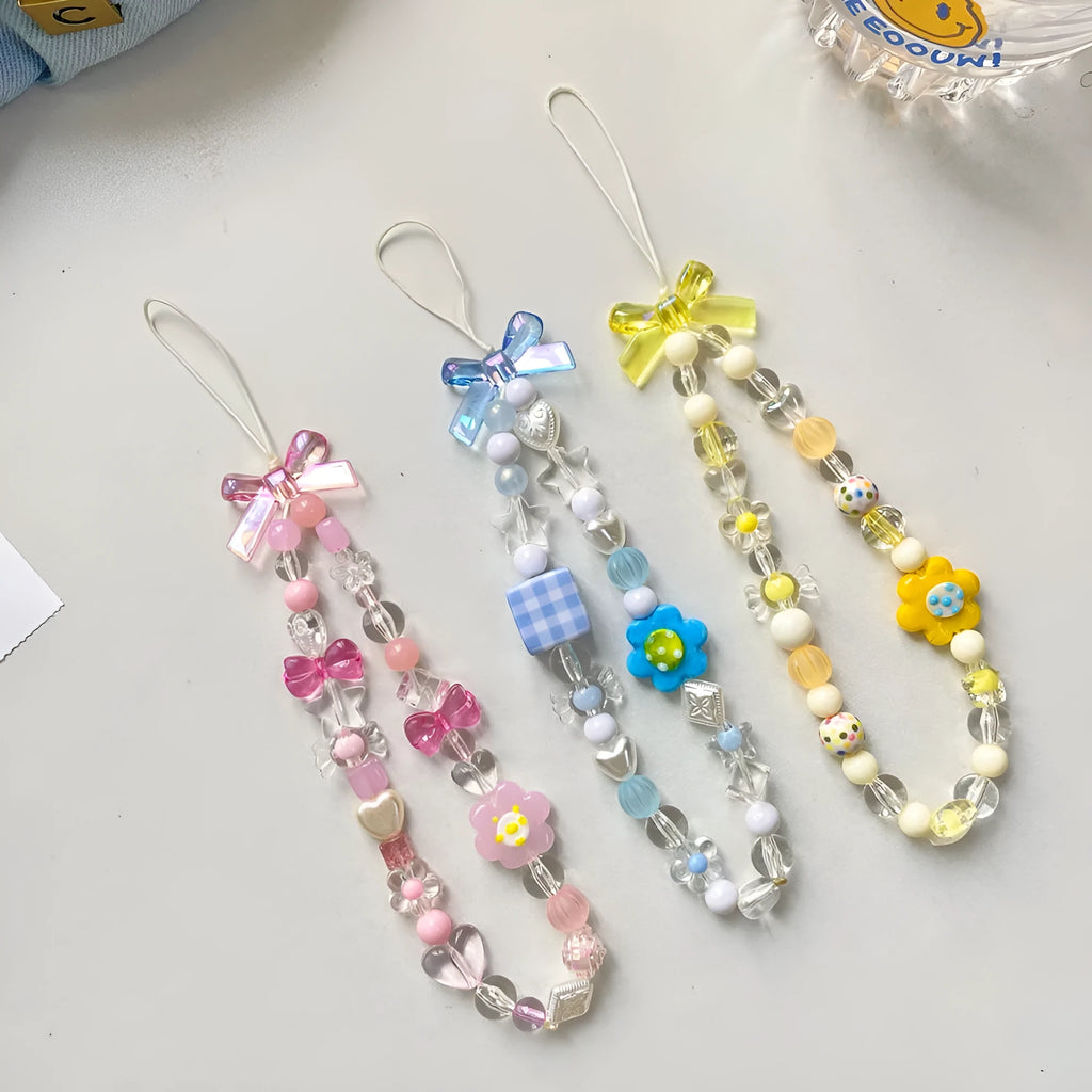 Beaded floral phone lanyard with colourful plastic resin beads on adjustable hand rope