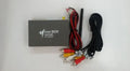 Black car mirror link box host unit with connecting AV cable, power cable, and antenna.
