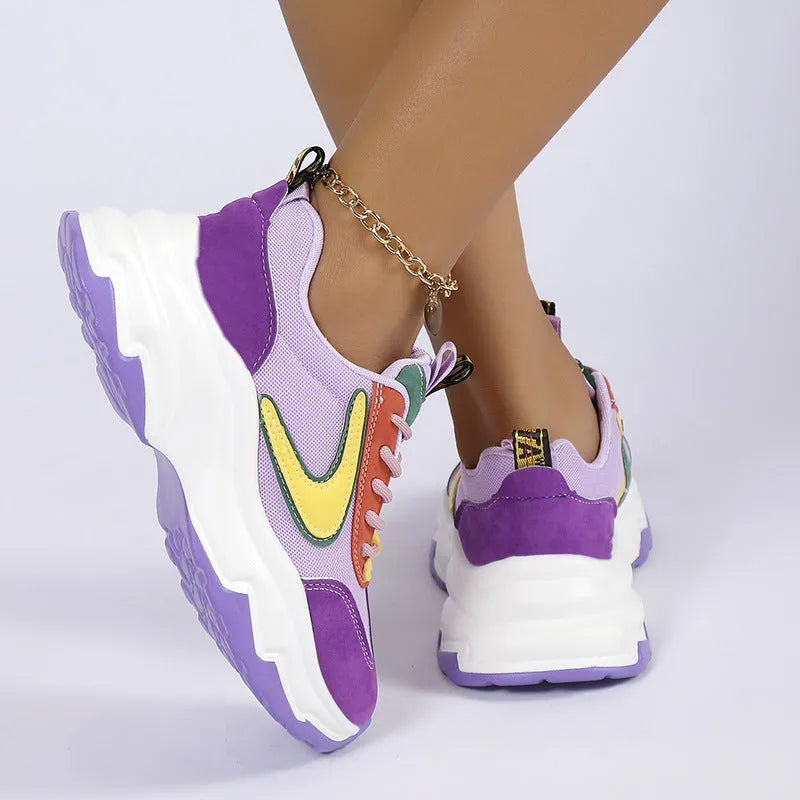 Mixed-colour women's lace-up sneakers with breathable mesh upper, thick rubber sole, and round toe in orange and purple