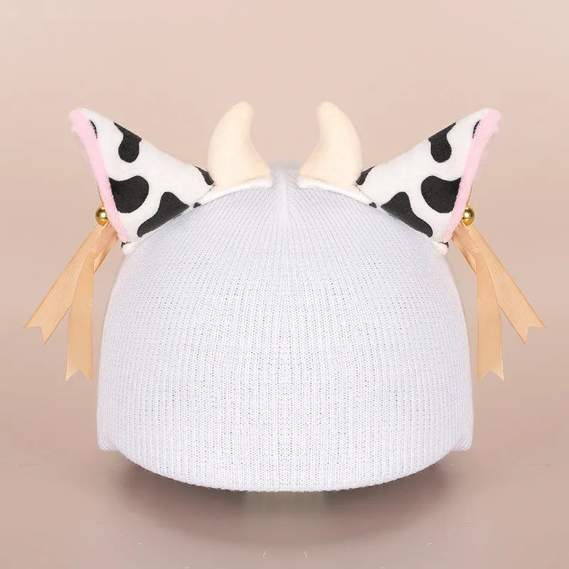 A soft plush cartoon character helmet cover for ears, shown in M size.
