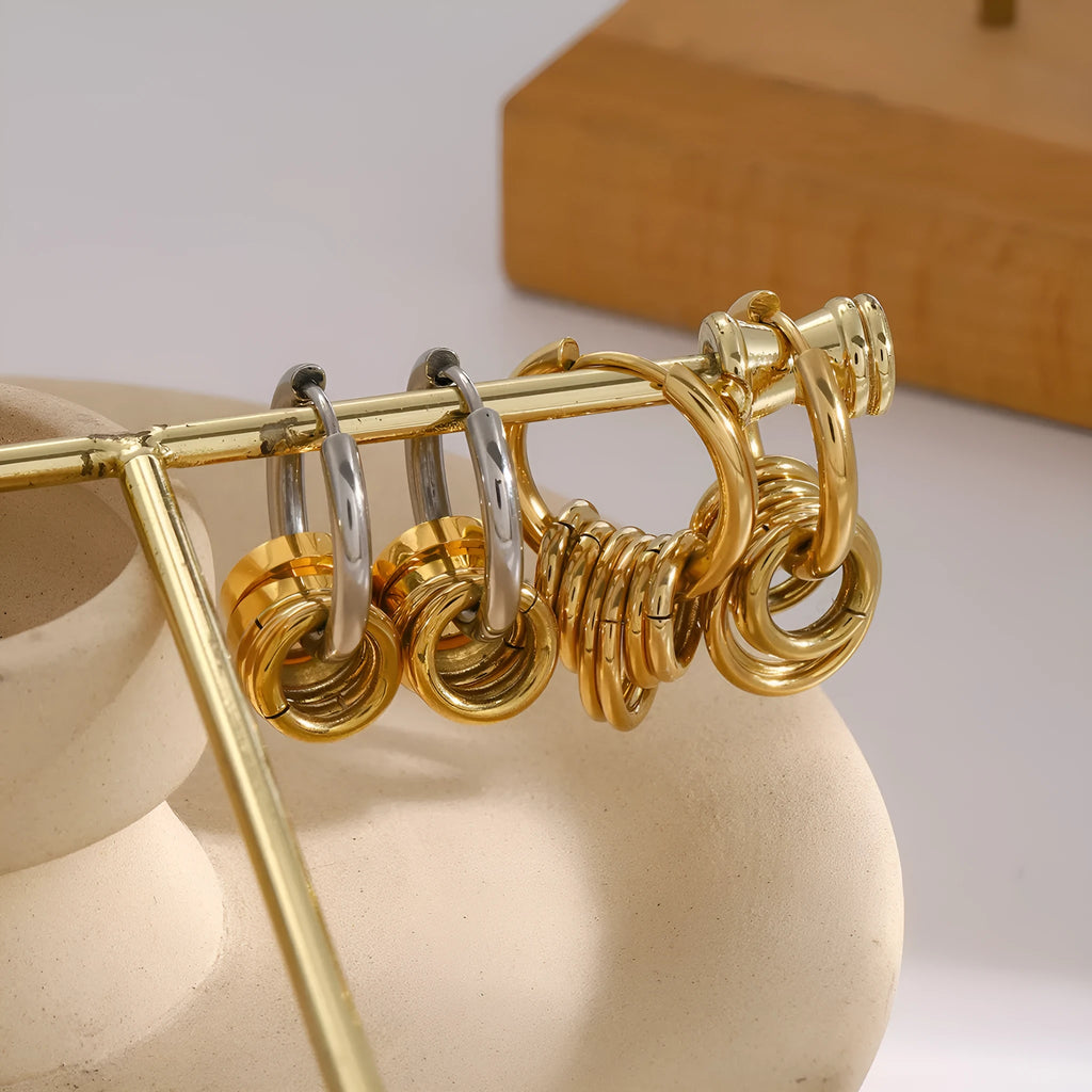 A pair of stainless steel ins style earrings with an electroplated colour finish.