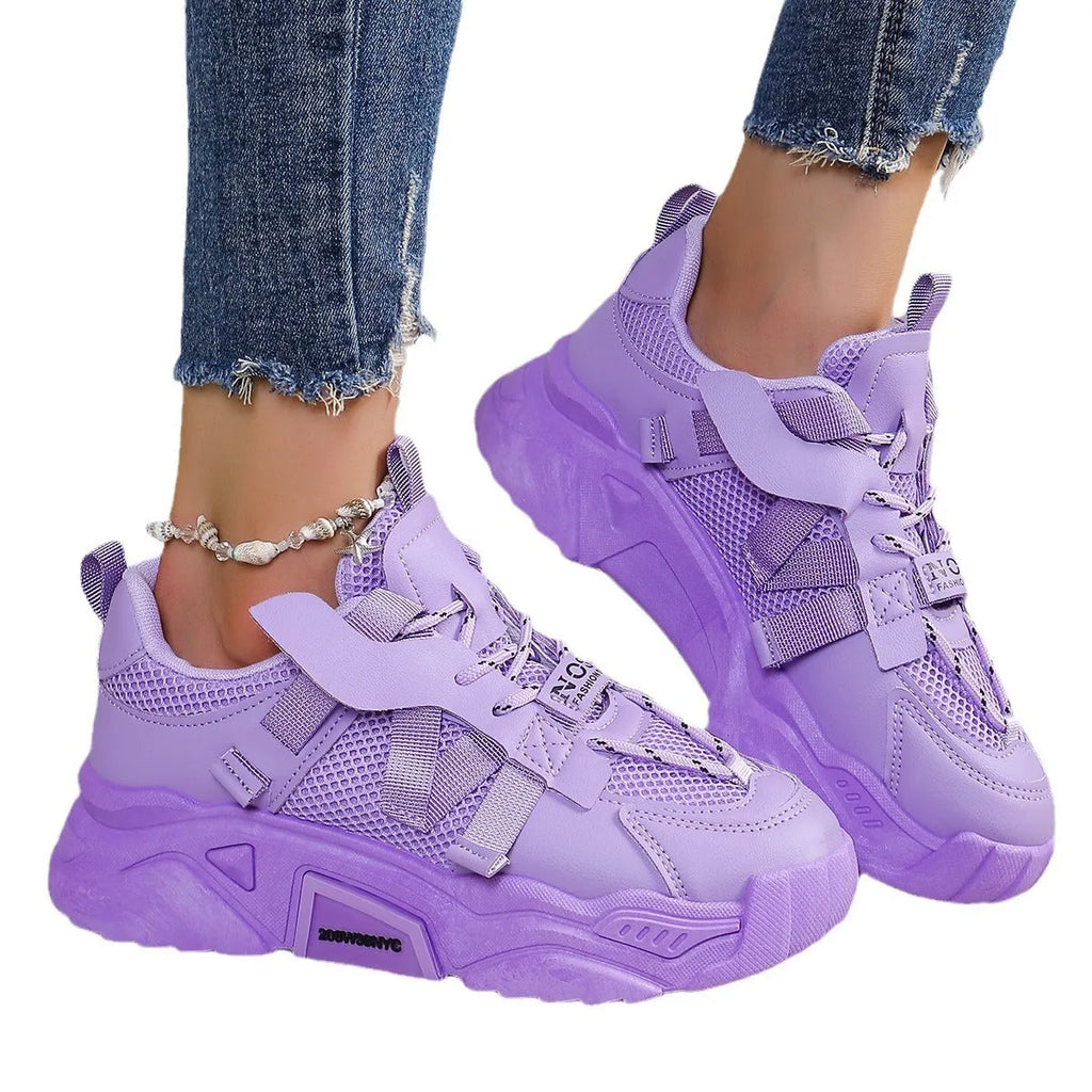 Women's purple platform mesh sports shoes with animal pattern detail and front lace-up closure