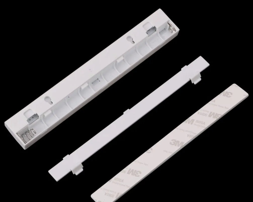 Aluminium LED closet light with magnetic back, shown illuminating a wardrobe interior.