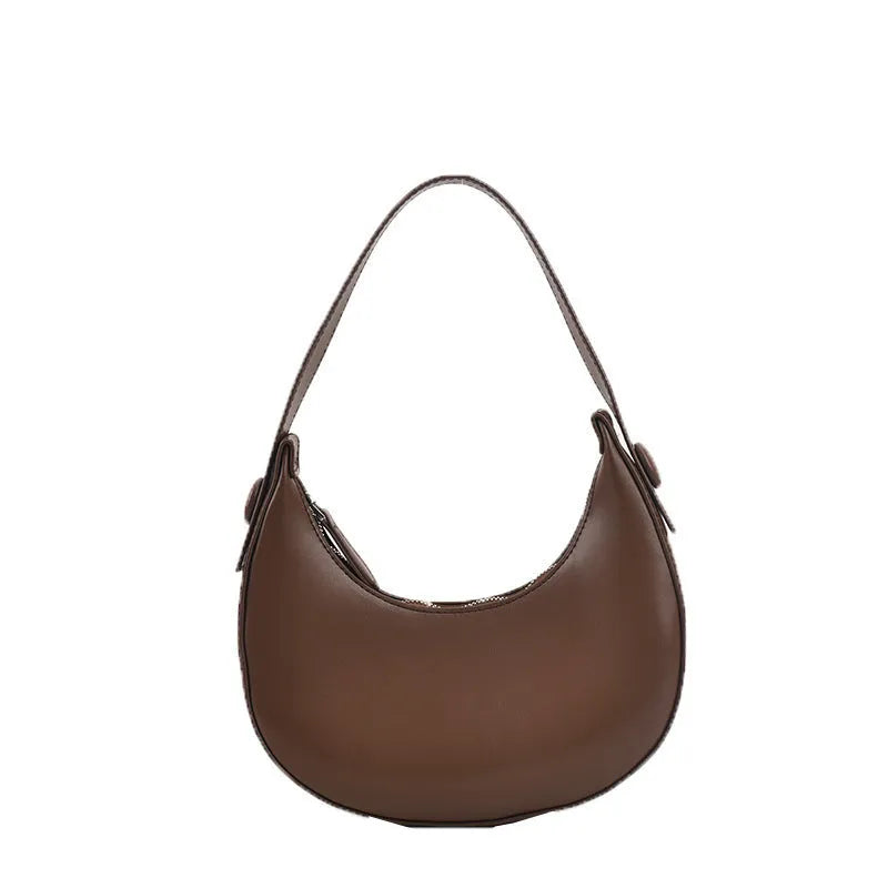 Retro dumpling-shaped women's shoulder bag in PU leather with a zippered pocket.