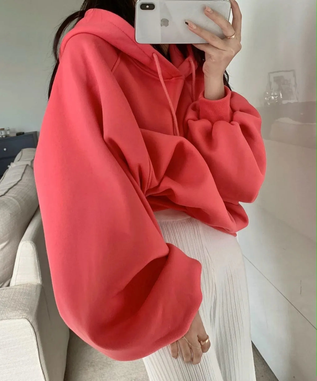 Women's loose watermelon red hooded sweater made from mulberry silk, shown sleeveless.
