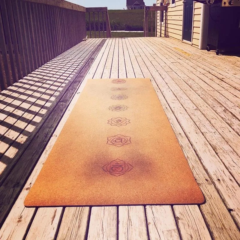 7 Chakra cork yoga mat, 183x68cm, with cork top and TPE or rubber base, rolled out on floor