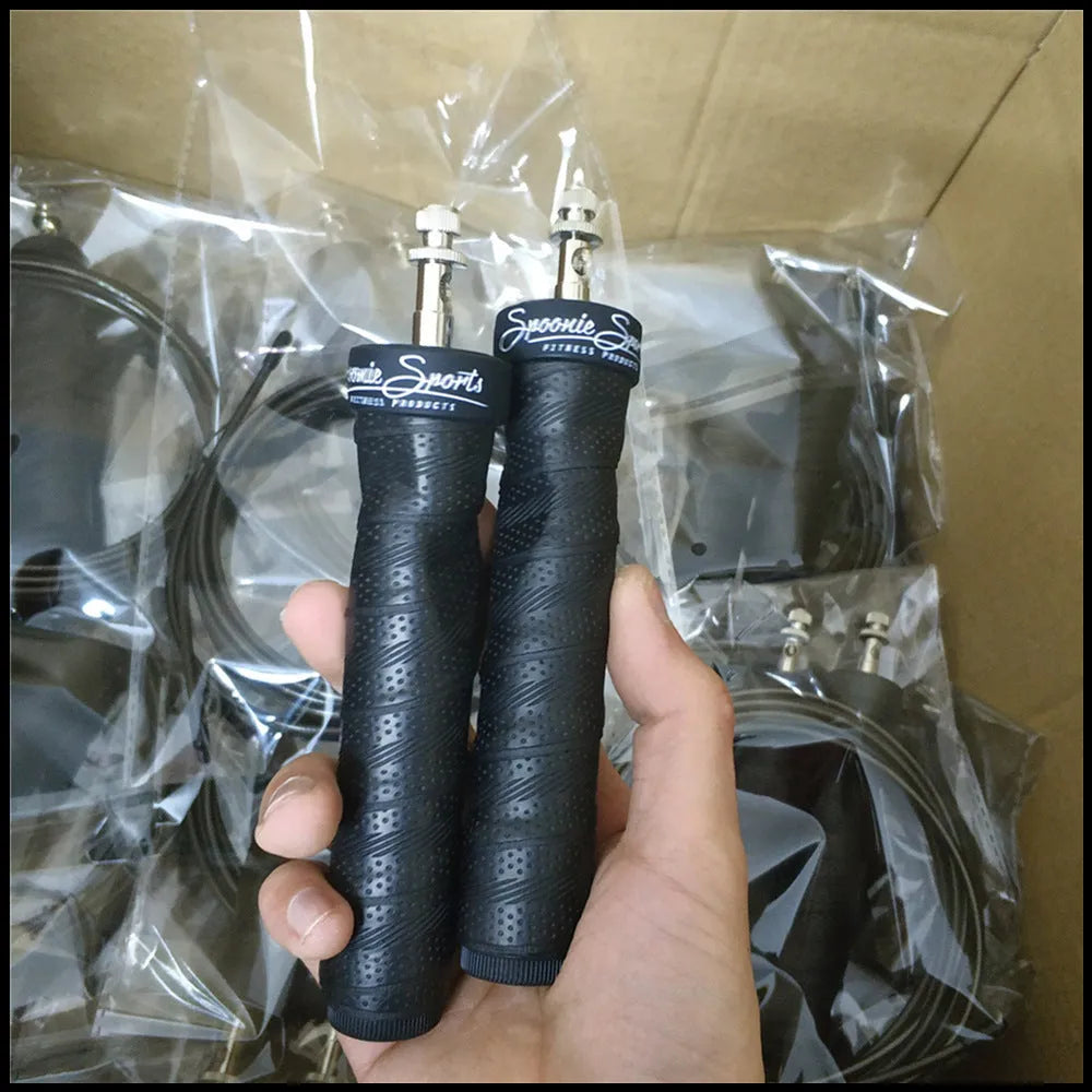 Jump rope with black PP handle, PU sweat belt, PVC wire rope on blue background