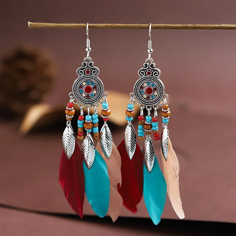 Round drop feather earrings with leaf pattern in alloy metal, available in multiple colours