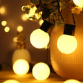 10-metre solar-powered decorative fairy lights with 40 LED lamps on black cord for outdoor use