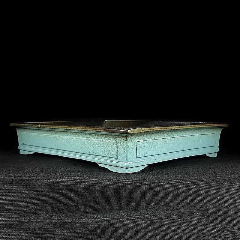 Green handmade ceramic bonsai flower pot with a retro crackled glaze finish.