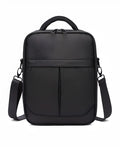 Black men's oxford fabric messenger bag showing its crossbody style and proportions.