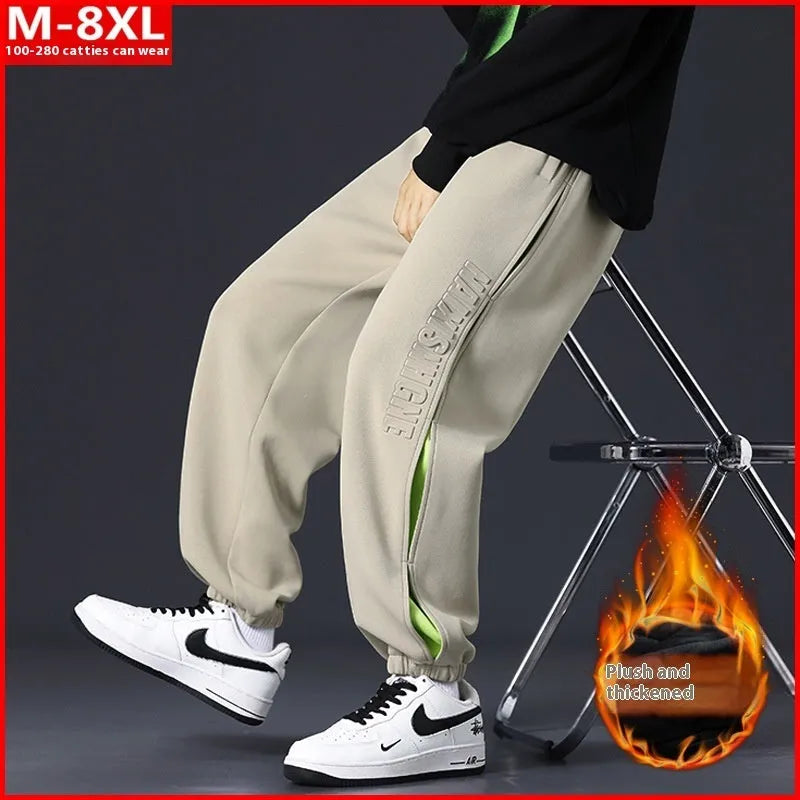Men's black ankle banded trousers with stitching detail and cotton micro-elastic fabric