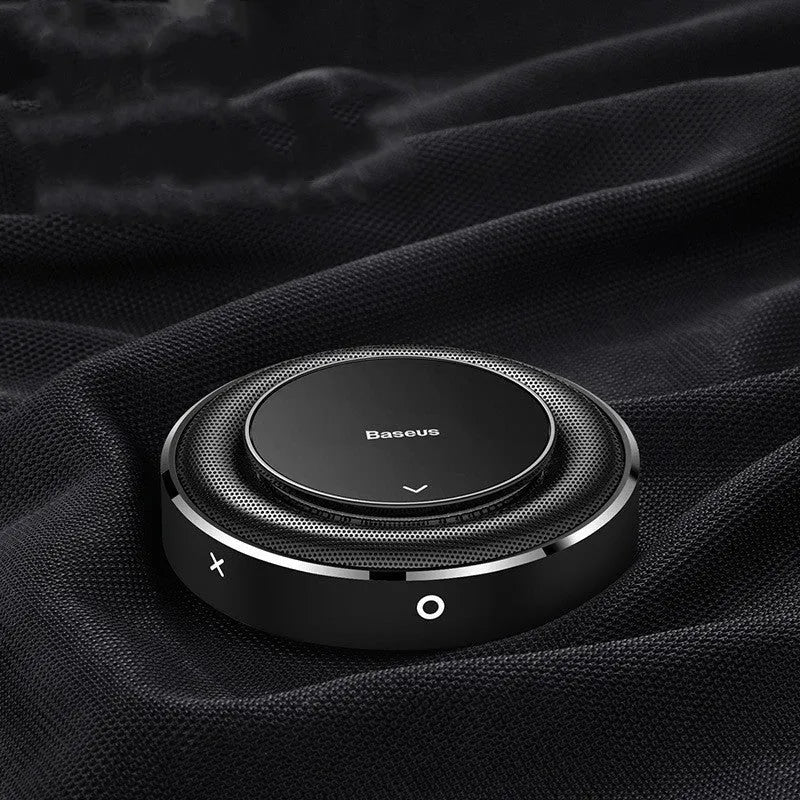 Black, red, and silver round aluminium alloy car fragrance seat with aromatherapy tablets.