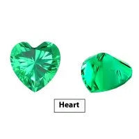 Selection of cultivated Columbia green emerald gemstones in various shapes and sizes on a white background.