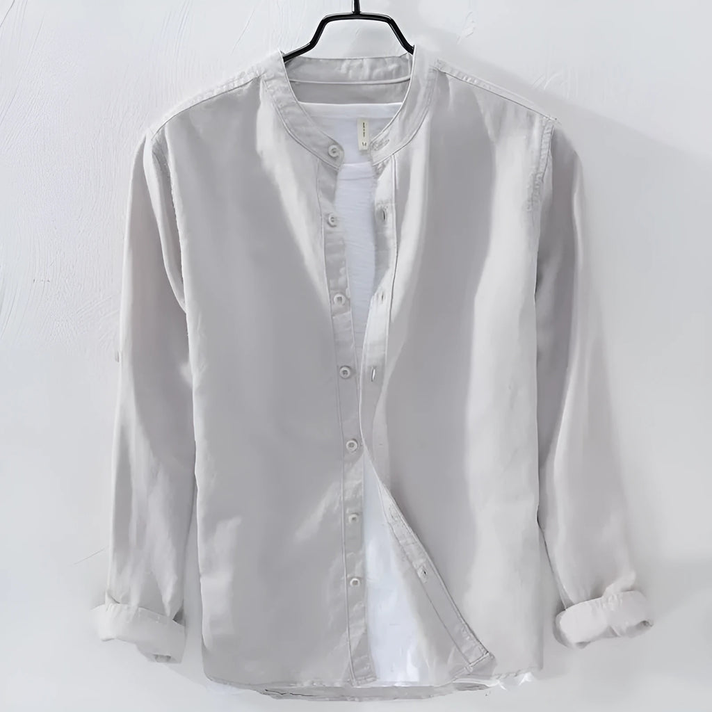 A loose-fit long sleeve casual shirt in a cotton linen blend, shown in a solid colour.