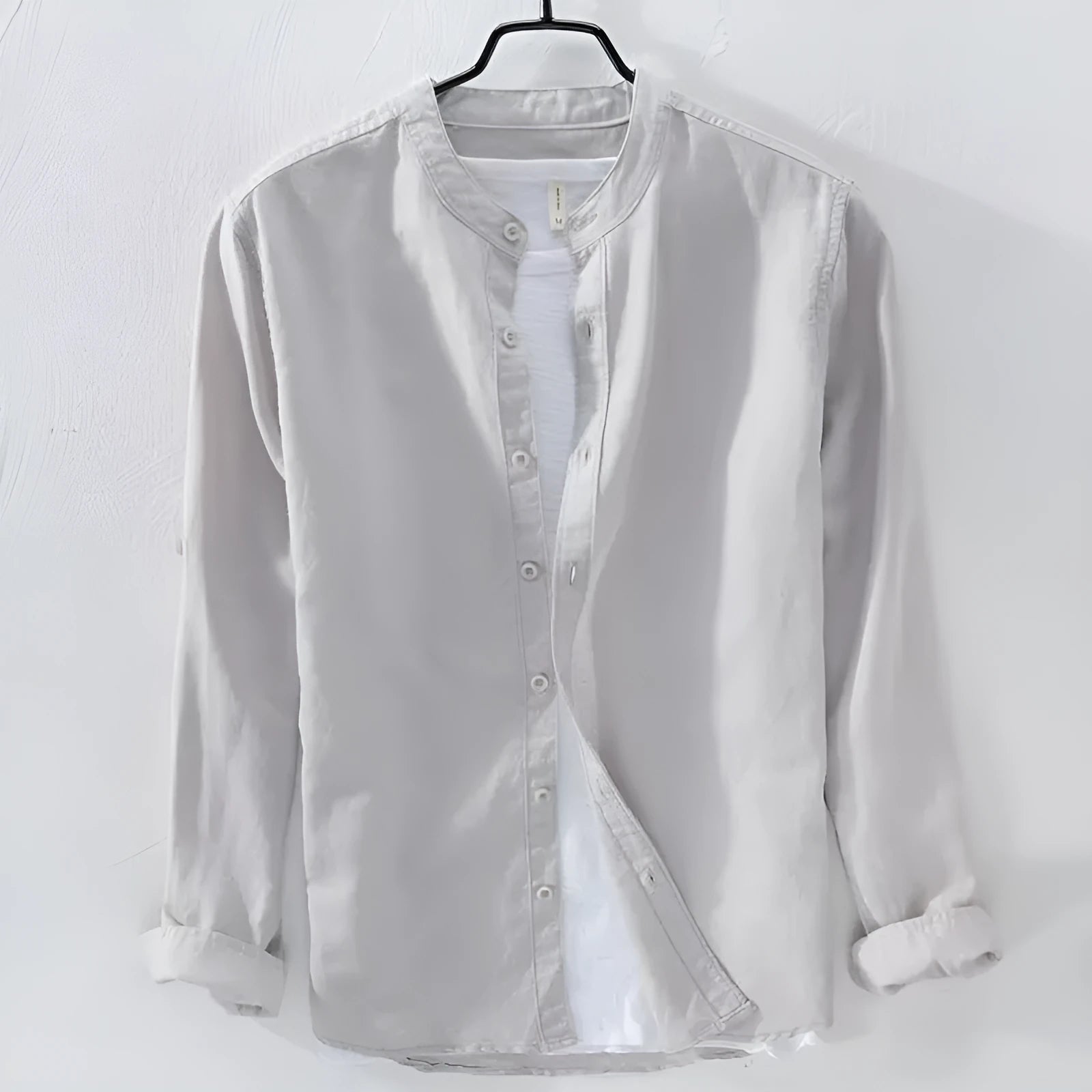 A loose-fit long sleeve casual shirt in a cotton linen blend, shown in a solid colour.