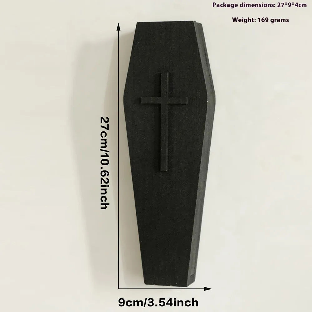Wooden cross-shaped wall shelf decoration in black colour measuring 27 cm wide
