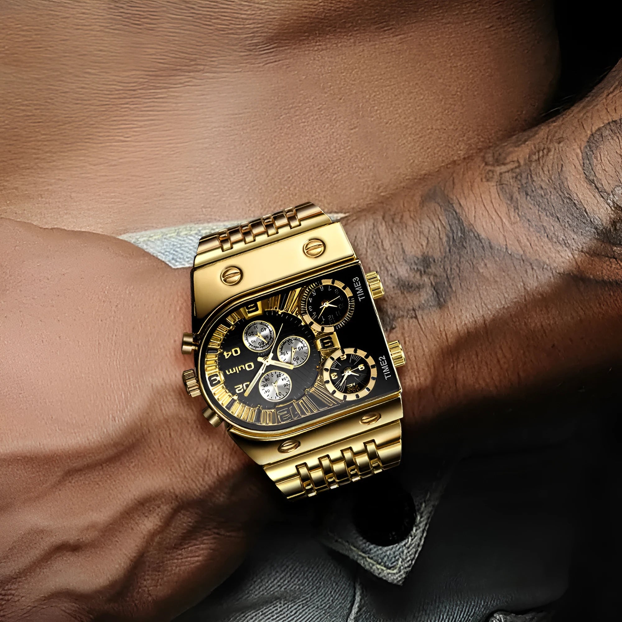 Luminous men's gold-tone watch with steel band and white multifunction dial against grey background