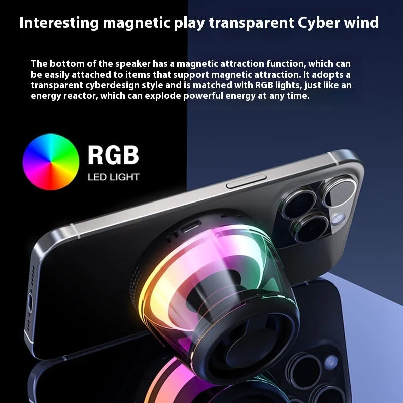 Portable white or black Bluetooth speaker with ambient lighting and magnetic design on a desktop