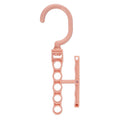 Blue plastic revolving wardrobe hanger with five rotating branches and a central handle.