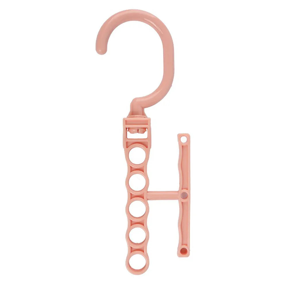 Blue plastic revolving wardrobe hanger with five rotating branches and a central handle.